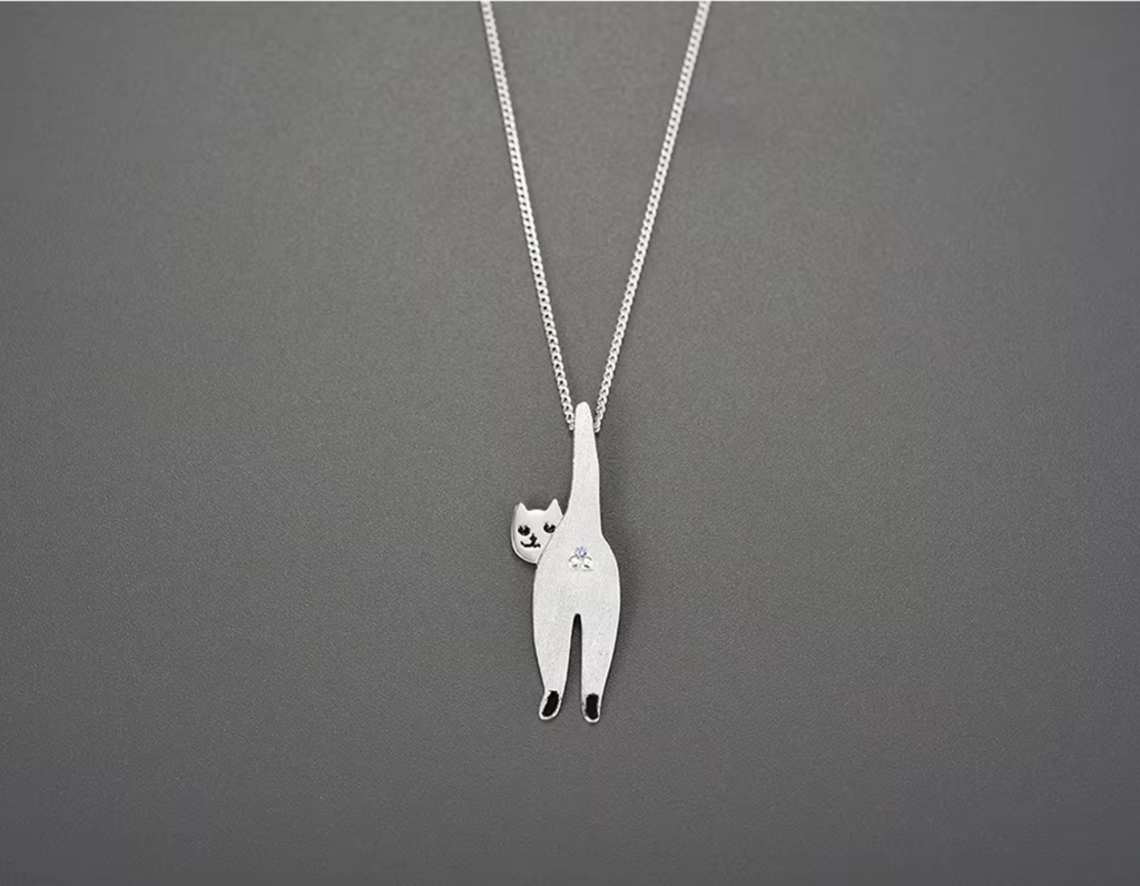 “Whisker of Dawn Pendant”