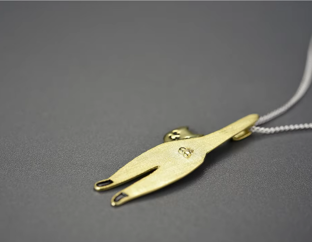 “Whisker of Dawn Pendant”