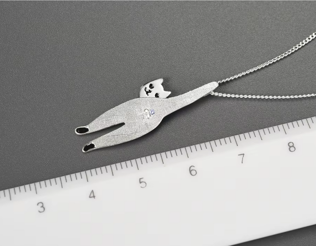 “Whisker of Dawn Pendant”