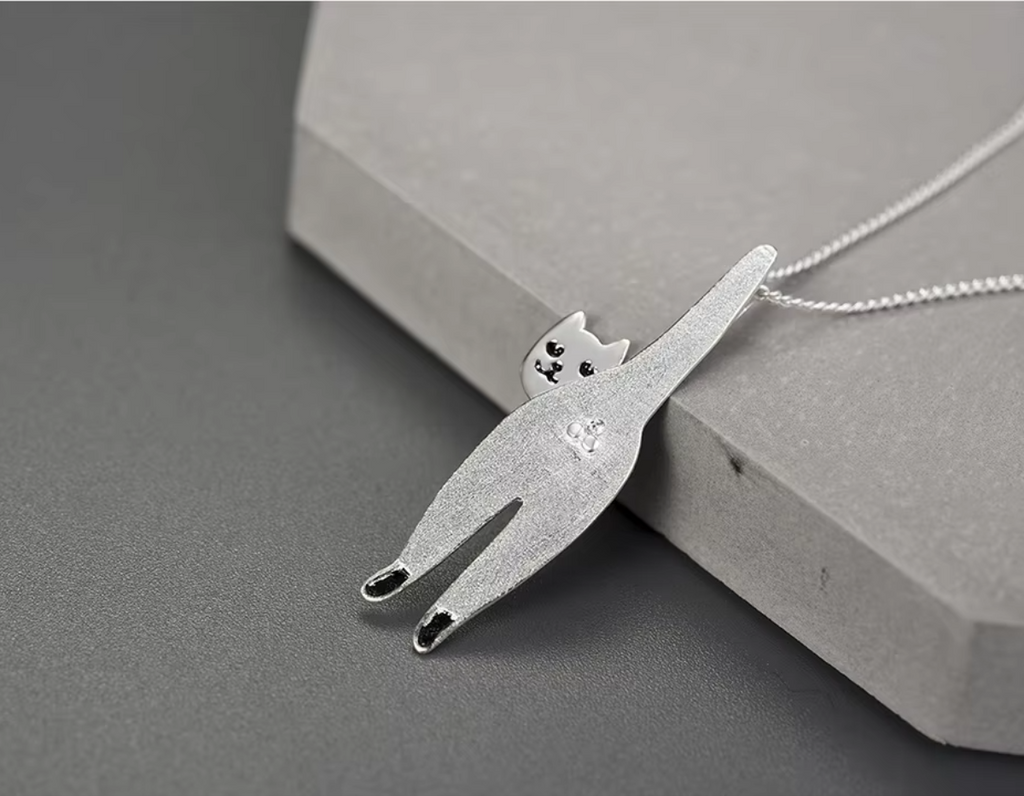 “Whisker of Dawn Pendant”