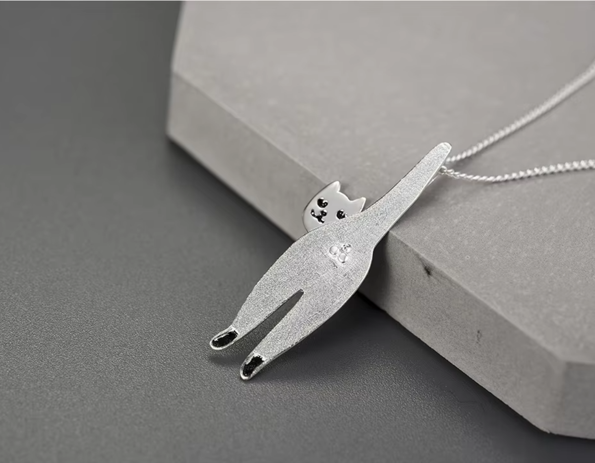 “Whisker of Dawn Pendant”