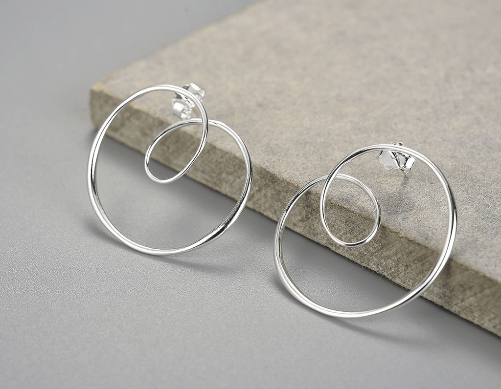 “Celestial Spiral Earrings”