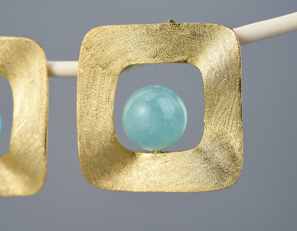 Solstice Embrace Studs