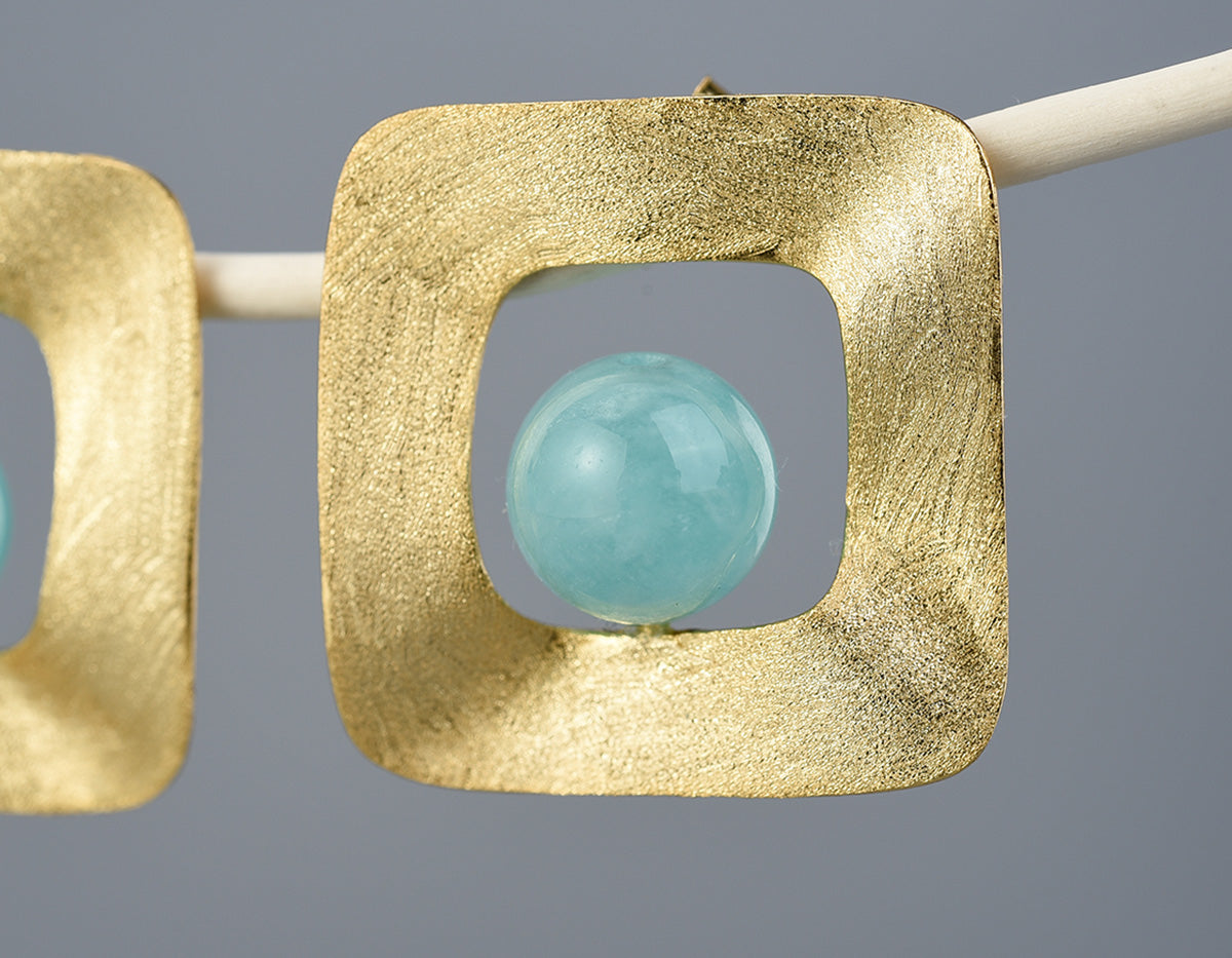 Solstice Embrace Studs